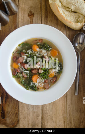 Polish soup with sausage, rice and kale Stock Photo