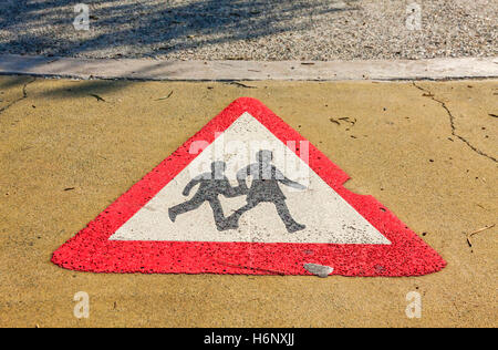 Pedestrian road sign, painted on asphalt for pedestrian lane at the Molos park in Limassol city, Cyprus Stock Photo