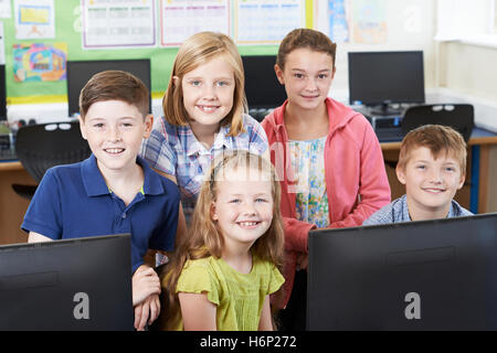 Portrait Of Elementary School Pupils In Computer Class Stock Photo