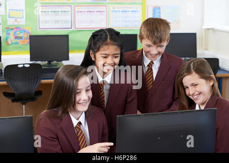Portrait Of Elementary School Pupils In Computer Class Stock Photo - Alamy