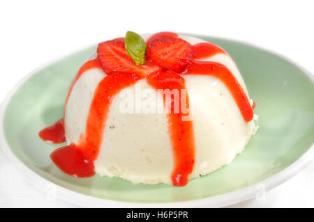 cream pudding with strawberry sauce Stock Photo