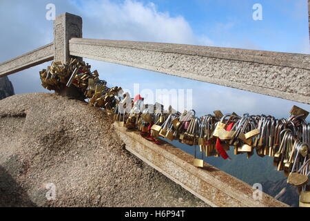 Hundreds of locks on a stone bridge in Huangshan, the Yellow mountains, Anhui province, China Stock Photo