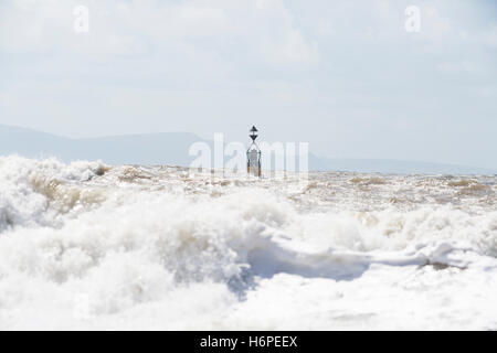 cardinal marker buoy in stormy seas Stock Photo