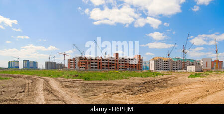 blue house building tower office build buildings big large enormous extreme powerful imposing immense relevant houses city town Stock Photo