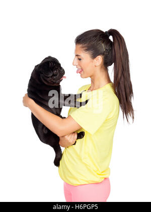 Brunette girl with her pug dog showing their tongues isolated on white background Stock Photo