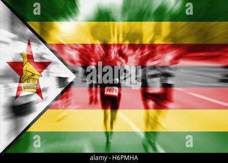 Marathon runner motion blur with blending  Zimbabwe flag Stock Photo