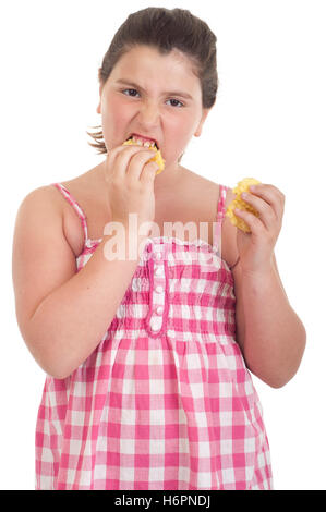 portrait small tiny little short hungry kid chips child eating eat eats girl girls food aliment beautiful beauteously nice Stock Photo