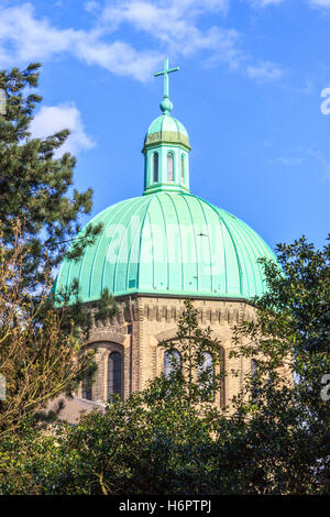 The green copper dome of St. Joseph's Roman Catholic Church on Highgate Hill, London, UK Stock Photo