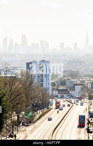 View South along Archway Road to a misty City of London, from Hornsey Lane Bridge, North Islington, London, UK Stock Photo