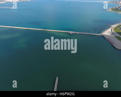 Top view of the bay Tsemess. The international sea port of Novorossiysk. Mol - building to stop the waves. Stock Photo