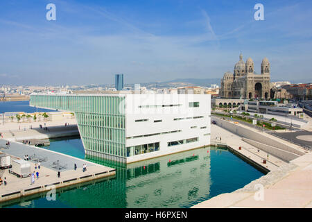 MARSEILLES, FRANCE - OCTOBER 20, 2014: The Villa Mediterranee and the Cathedrale de la Major (main cathedral), in Marseilles, Fr Stock Photo