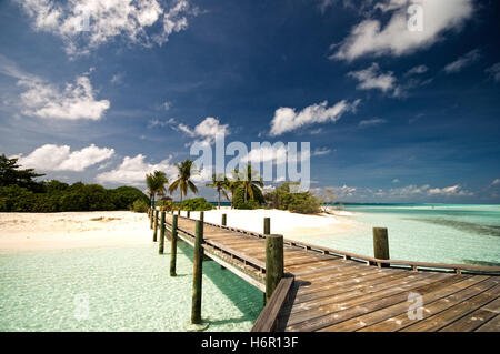 wooden bridge to desert island Stock Photo