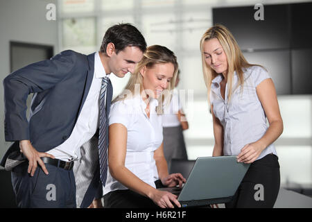 office laptop notebook computers computer laugh laughs laughing twit giggle smile smiling laughter laughingly smilingly smiles Stock Photo
