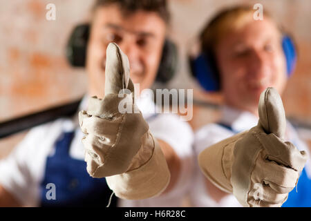 construction workers at the construction site Stock Photo