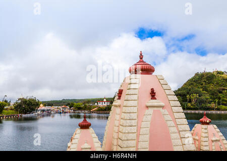 Temples by volcanic crater lake of Grand Bassin, also known as 'Ganga Talao' or 'Ganges Lake', Mauritius, Africa Stock Photo