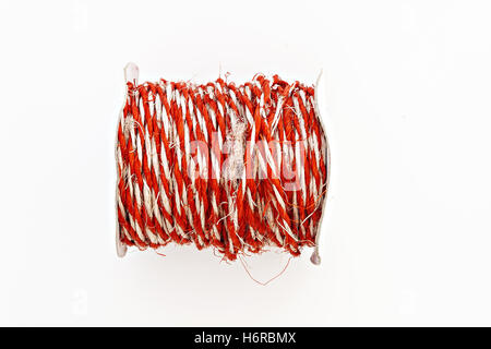 kraft red twine in a roll isolated. Stock Photo