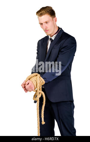 Young businessman in a suit tied up Stock Photo