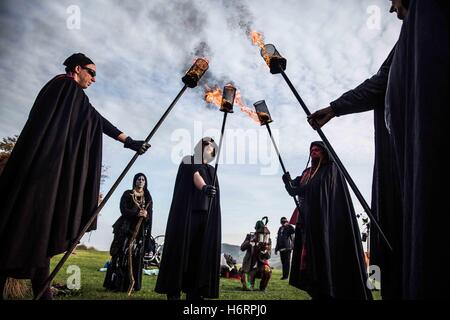Edinburgh, UK. 1st Nov, 2016. Traditional rituals.Samhain - Halloween festival in Edinburgh, Scotland.Behind the scenes of all day of one of the tribes, rituals and the night march. Credit:  David Tesinsky/ZUMA Wire/Alamy Live News Stock Photo