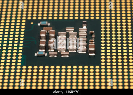Electronic collection - Computer processor chip (CPU) from the bottom side isolated on white background Stock Photo