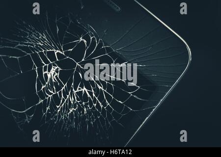 Cellphone Broken Display Closeup Photo. Broken Smartphone Device. Stock Photo