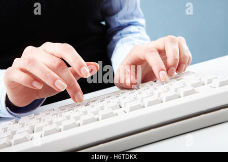 blue office laptop notebook computers computer type hand hands keyboard PC board model build secretary tool object job macro Stock Photo