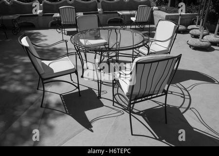 Furniture, patio, metal, black, iron, wrought, outdoor, chair, garden, empty, design, relax, table, white, ornate, seat, relax. Stock Photo