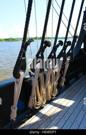 Ropes on the replica Nina. Decking boards. Stock Photo