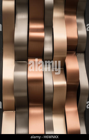 Luxury shiny golden, silver and rust-colored modern wall background Stock Photo