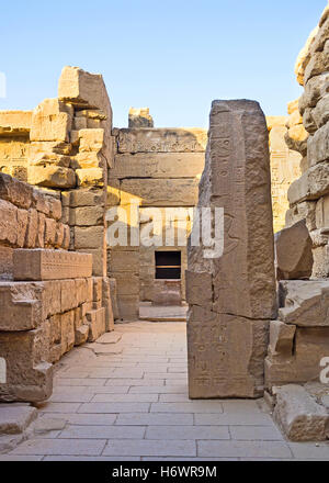 The side chambers of Khonsu Temple with the remains of reliefs on the walls, Karnak Complex, Luxor, Egypt. Stock Photo