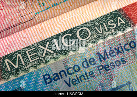 Visa of Mexico in the international passport and Mexican pesos, closeup Stock Photo