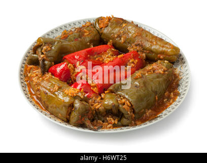 Traditional Moroccan dish with stuffed bell peppers and rice on white background Stock Photo