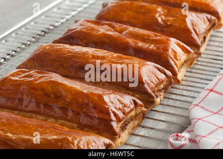 Fresh baked sausage rolls out of the oven Stock Photo