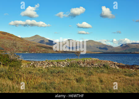 Light fluffy clouds over Loch Scridain on the Isle of Mull with Ben More at the head of the loch on the left Stock Photo