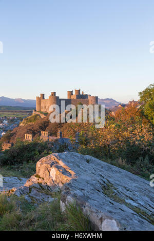 Autumn evening light over Harlech Castle, Snowdonia National Park, Gwynedd, North Wales, UK Stock Photo