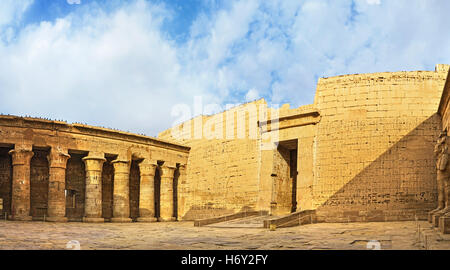 Panorama of the peristyle court of Habu Temple with the monumental columns and huge stone walls, covered with hieroglyphs, Luxor Stock Photo