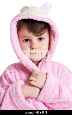 Three years old girl in pink bathrobe. Stock Photo