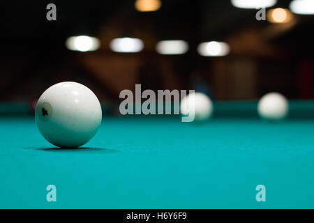 Russian billiard in club, balls on green table cloth Stock Photo