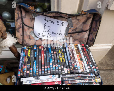 A box of used  Horror DVD's outside a shop in Whitby North Yorkshire UK Stock Photo