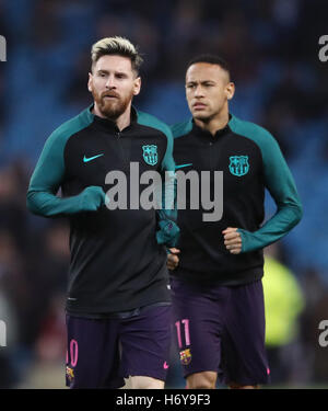 Barcelona's Lionel Messi (left) and Neymar warm up before the UEFA Champions League match at the Etihad Stadium, Manchester. Stock Photo