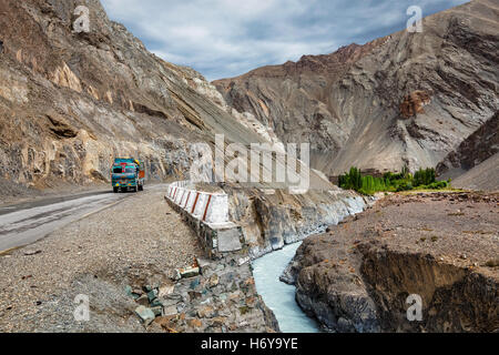 Indian lorry trucks on highway in Himalayas. Ladakh, India Stock Photo