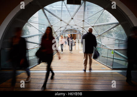 Manchester glass walkway Arndale connect   Shoppers walk through glass tunnel connecting Manchester Arndale centre  Marks Spence Stock Photo