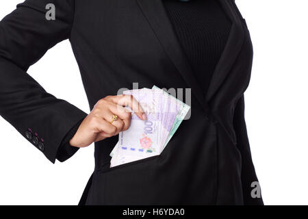 a photo of woman holding a bribery money isolated in white background Stock Photo