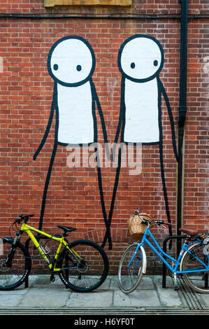 Graffiti by Stik painted for the Chichester Street Art Festival. Stock Photo