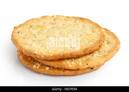 Three golden cheese crackers on white. Stock Photo