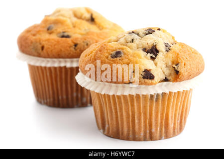 Two light chocolate chip muffins in wax liner on white. Stock Photo