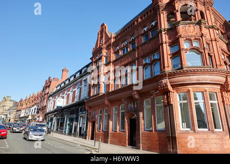 Library street and Wigan library former municipal building England United Kingdom Stock Photo