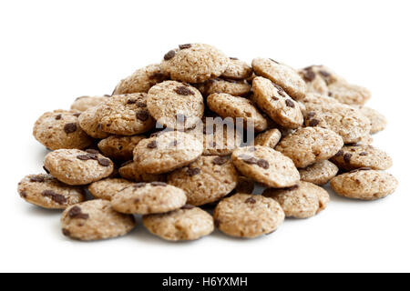 Heap of chocolate chip cookies cereal isolated on white. Stock Photo