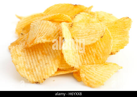 Crinkle cut crisps on white background. Stock Photo