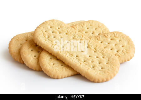 Pile of traditional rich tea english biscuits isolated on white. Stock Photo