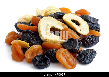 Pile of mixed dried fruit isolated on white. In perspective. Stock Photo